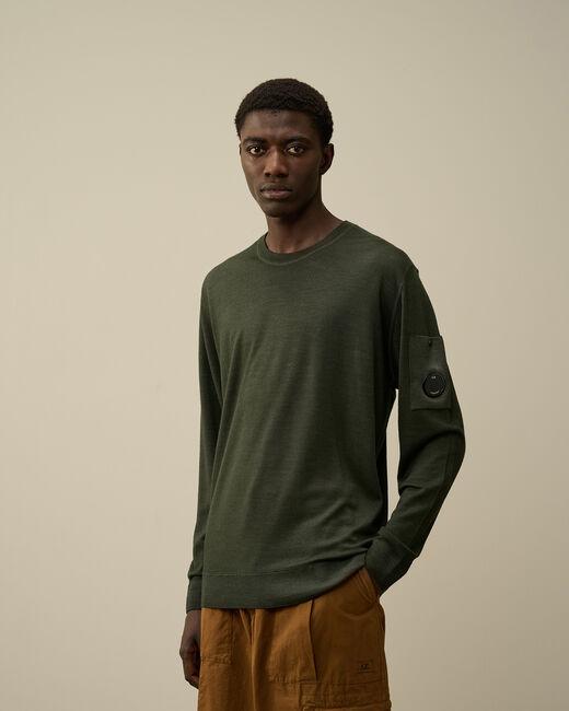 maglia in lana merino con logo 17CMKN091A 003247F 674 CP COMPANY 