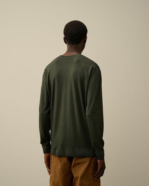 maglia in lana merino con logo 17CMKN091A 003247F 674 CP COMPANY 