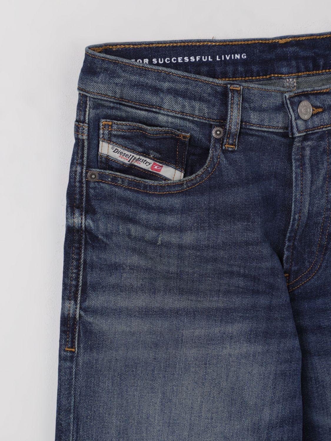 jeans in denim con strappi J00808 KXBPJ K01 DIESEL 