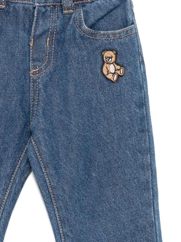 jeans con patch MMP04ZL0E29 40335 MOSCHINO KIDS 