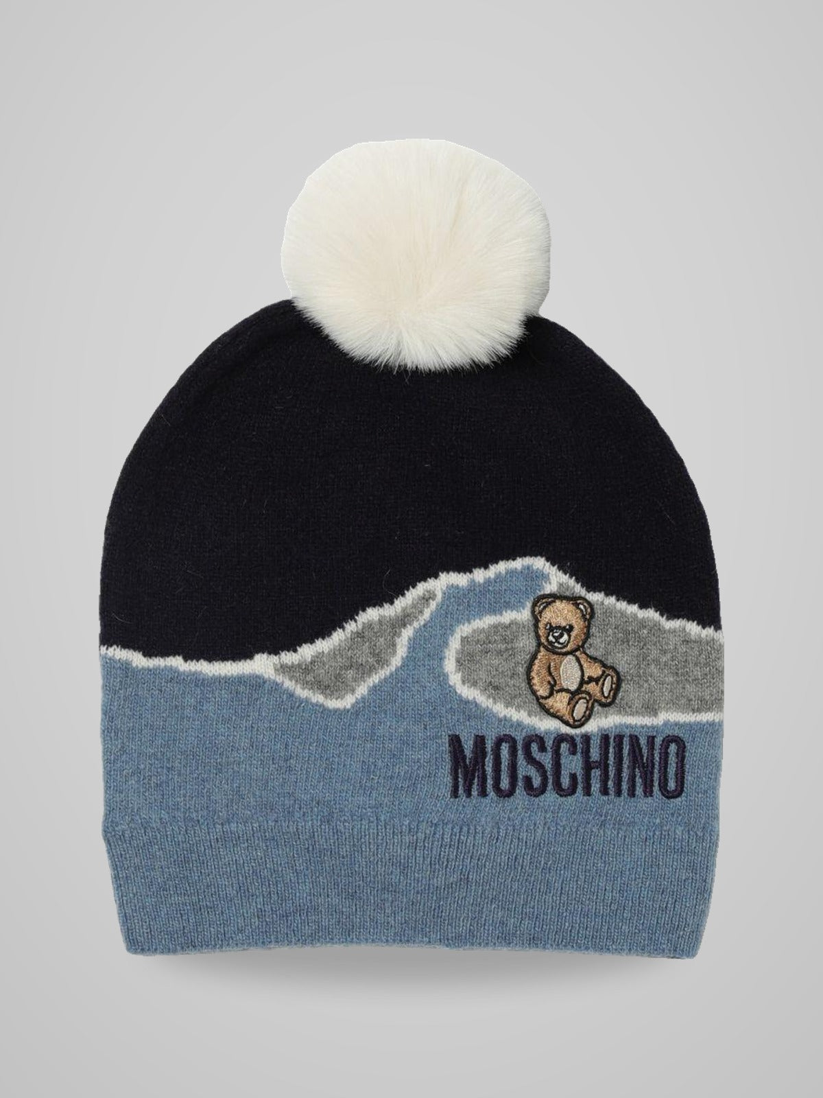 cappellino con pom pon