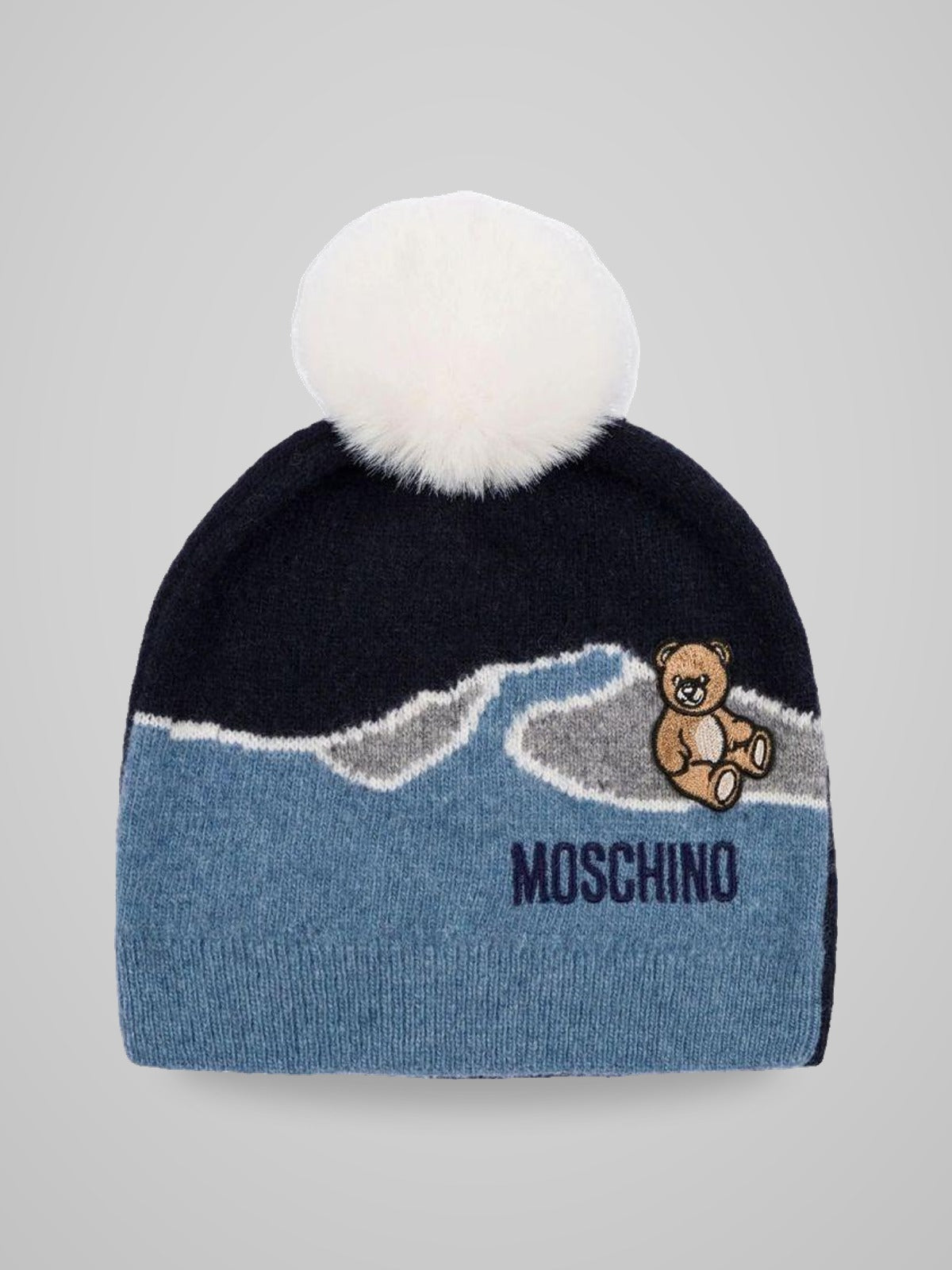 cappello con applicazione pom pon